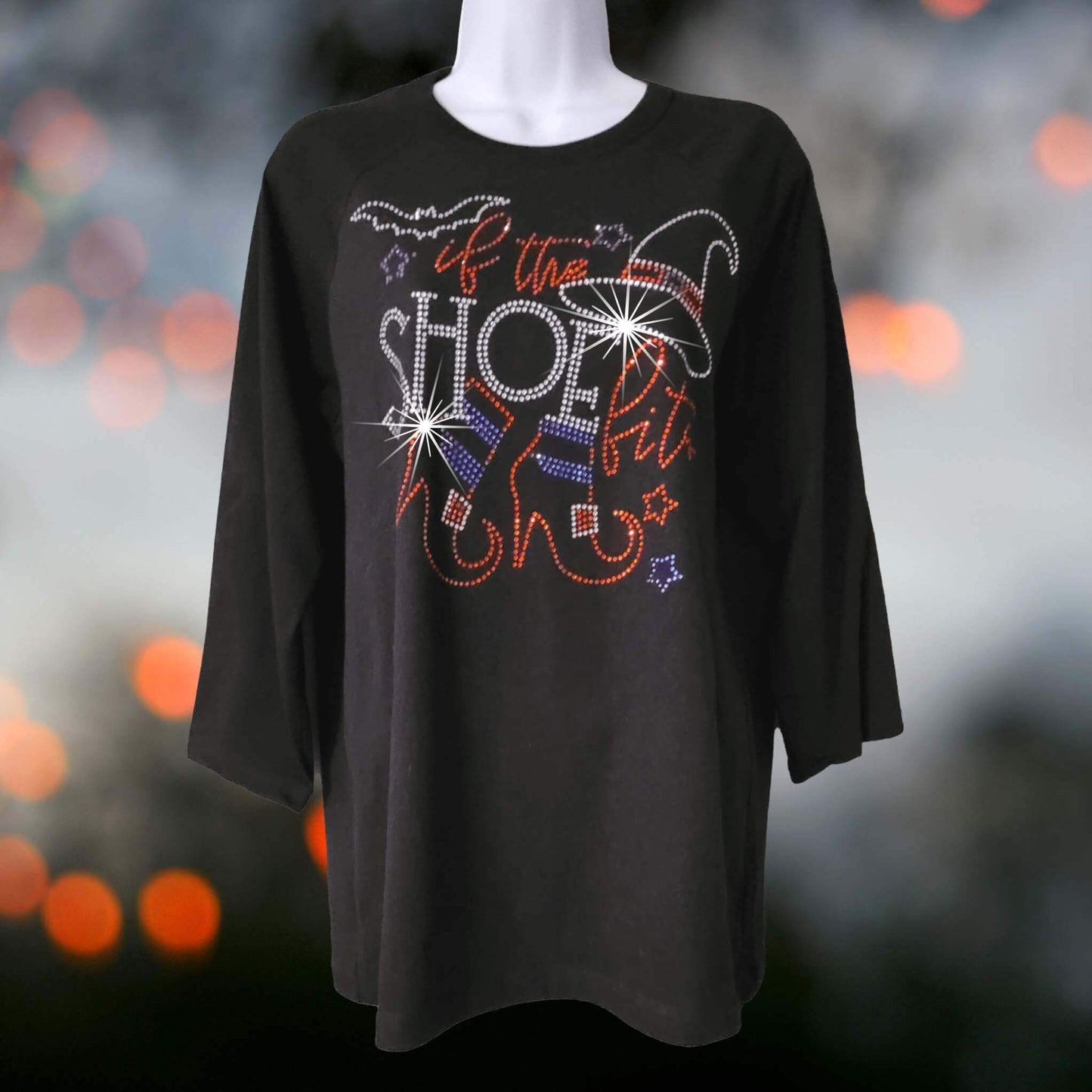 Women’s black Halloween rhinestone shirt with witch hat and boots design that says “If the Shoe Fits” — sparkly bling long sleeve tee.